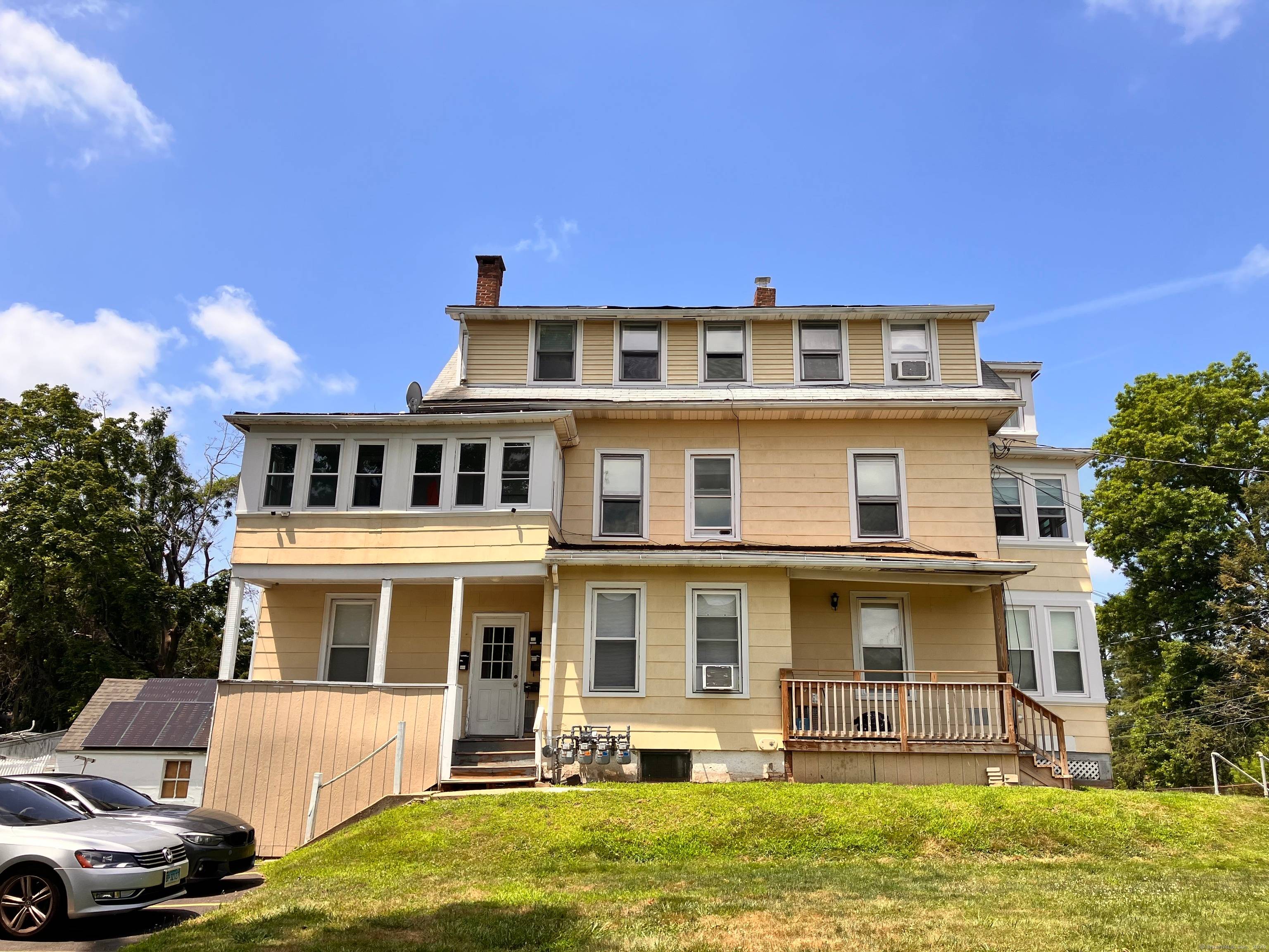 4 family home located on a quiet dead end street near downtown Meriden.