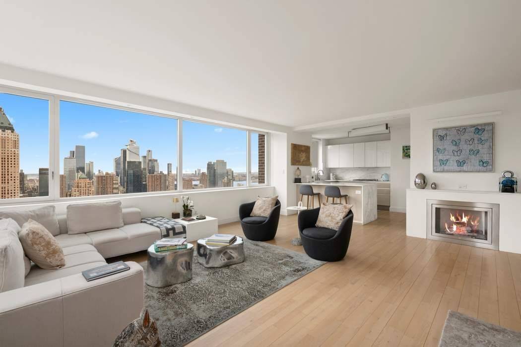 Live above it all in this exceptional high floor residence at the Sheffield Condominium, where breathtaking South and East exposures frame iconic New York City views from the 50th floor.
