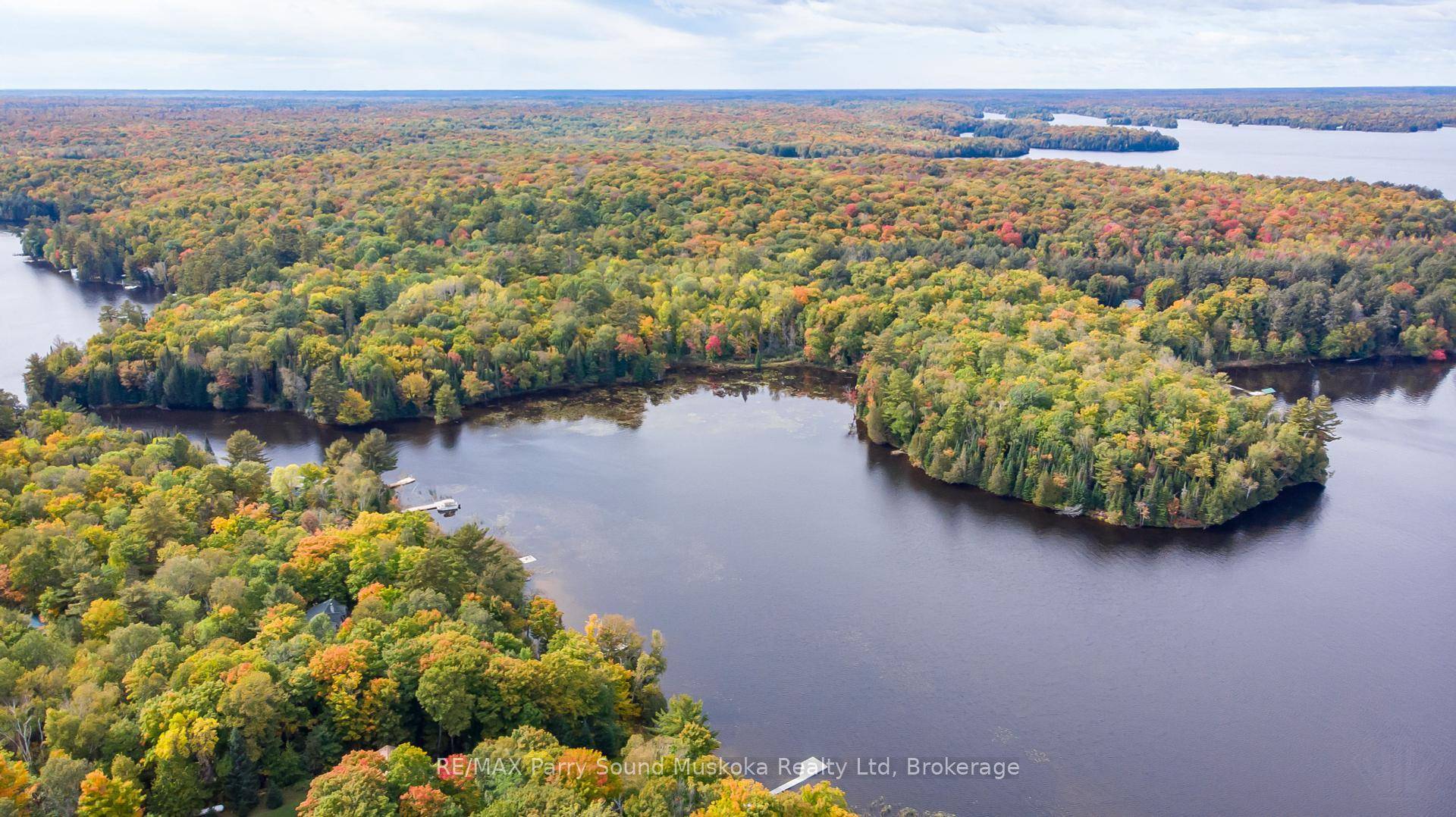 This prime lot offers 1, 148 feet of mixed shoreline on Ahmic Lake and the narrows leading into Neighick Lake.