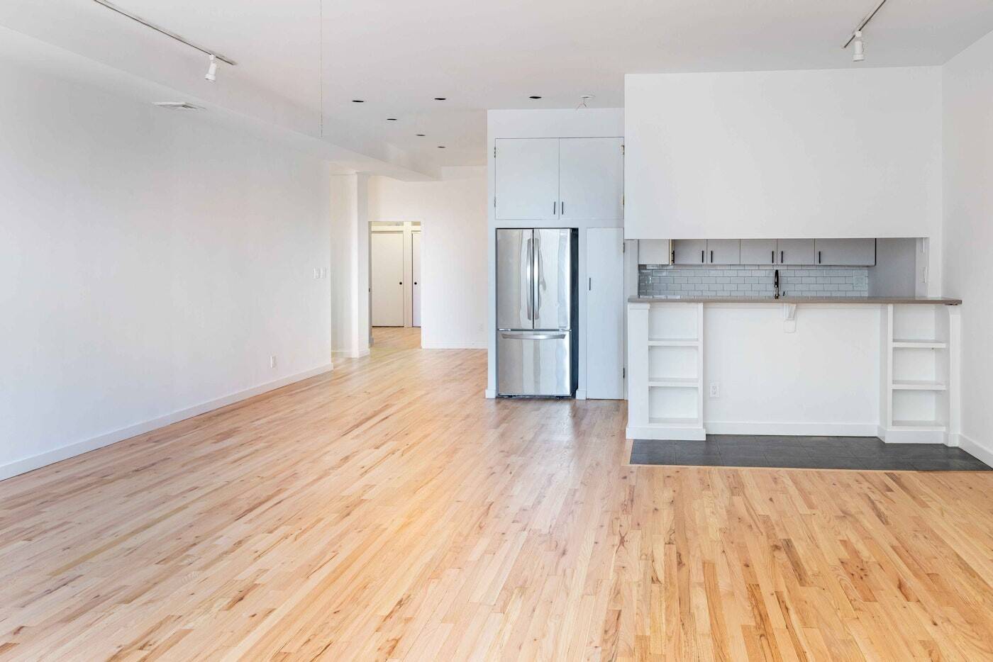This timeless prewar loft in the heart of FiDi offers classic New York charm.