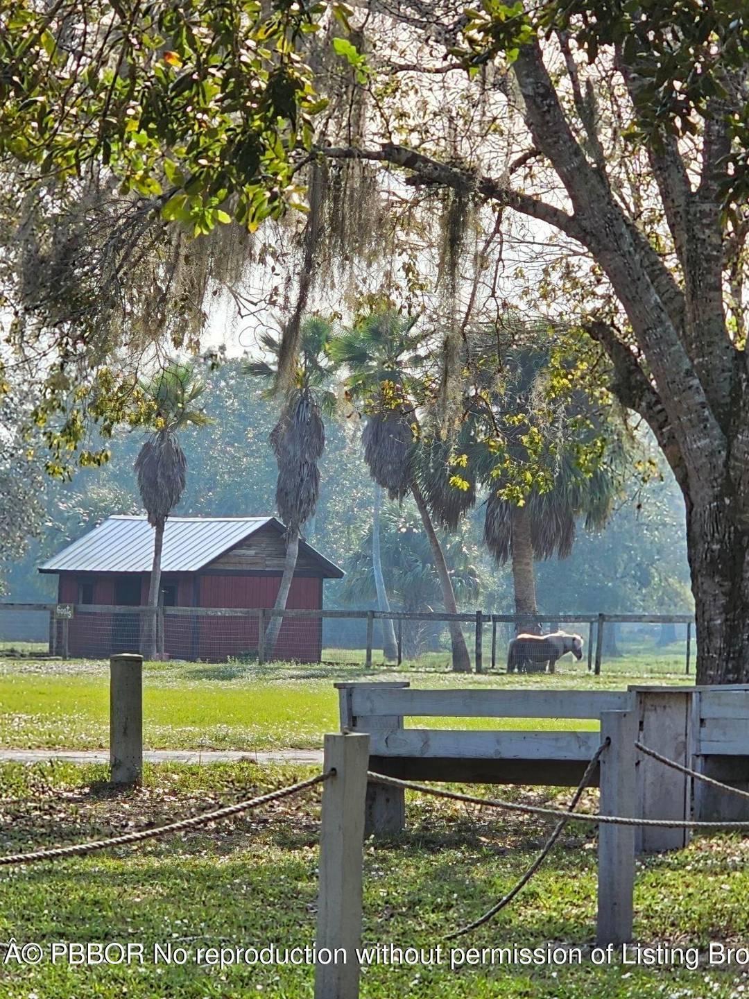 Must see this 20 acres Farm complex with angelic large oak trees featuring a main house 3 2 amp ; a Lodge with 5 guest studio suits.