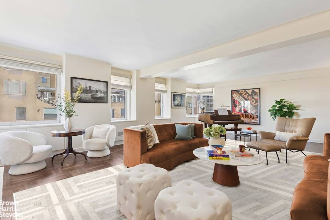 This expansive sun filled corner residence offers a high floor vantage point, a desirable split bedroom layout, and generous proportions for comfortable living and entertaining.