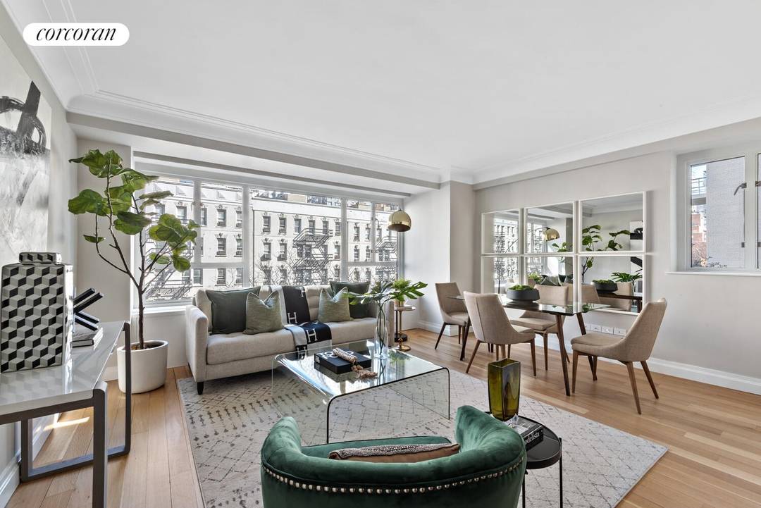 This beautiful split two bedroom, two bath home in the prestigious Manhattan House Condominium is flooded with light.