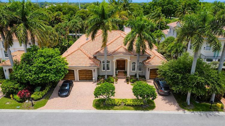 Welcome to this extraordinary waterfront estate in Harbour Isles, one of North Palm Beach's most prestigious gated boating communities.