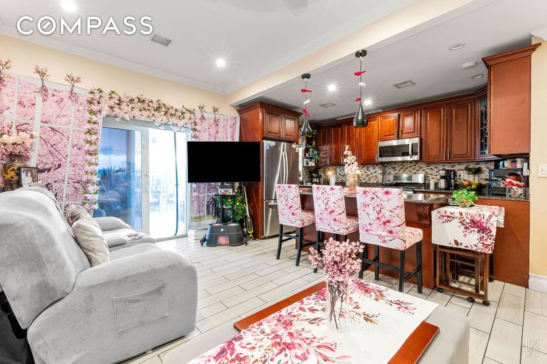 Located on a quiet, well kept block in Ridgewood, 1842 Norman Street is a handsome brick two family townhouse that immediately feels right the moment you step inside.