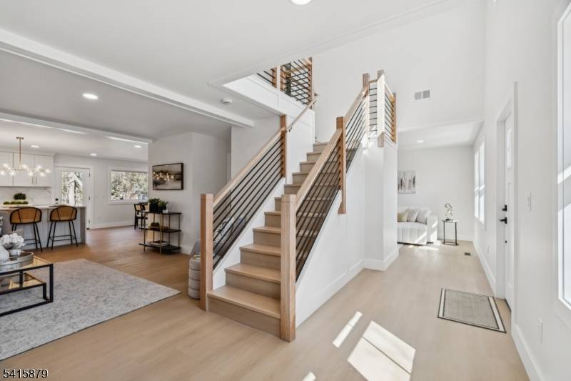 Experience modern living in this stunning brand new rebuild offering over 3, 500 square feet of livable space, not including the beautifully finished basement.