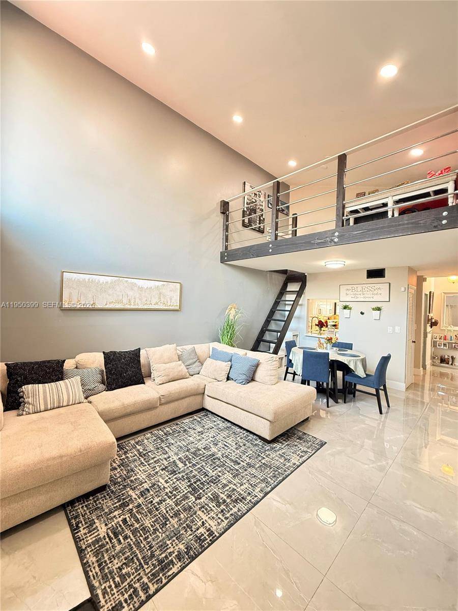 One of a kind, completely renovated corner unit townhouse offering features rarely found in this community.