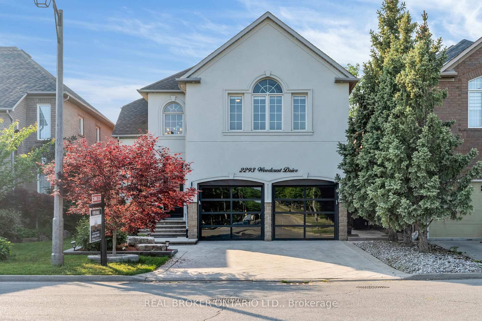 Welcome to 2293 Woodcrest Drive, a beautifully renovated 5 bed, 5 bath executive home in Oakville's coveted Westmount community.