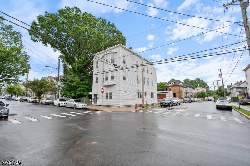 Don't miss this rare opportunity to own this legal 3 family property with DCA green card situated on a large corner lot in this great Elizabeth location.