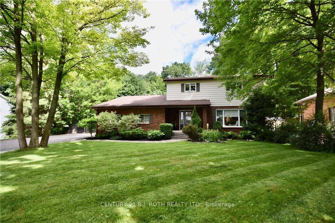Welcome to 32 Wattie Road, an updated, elegant two storey family residence, featuring five bedrooms and three baths in the coveted community of Midhurst.