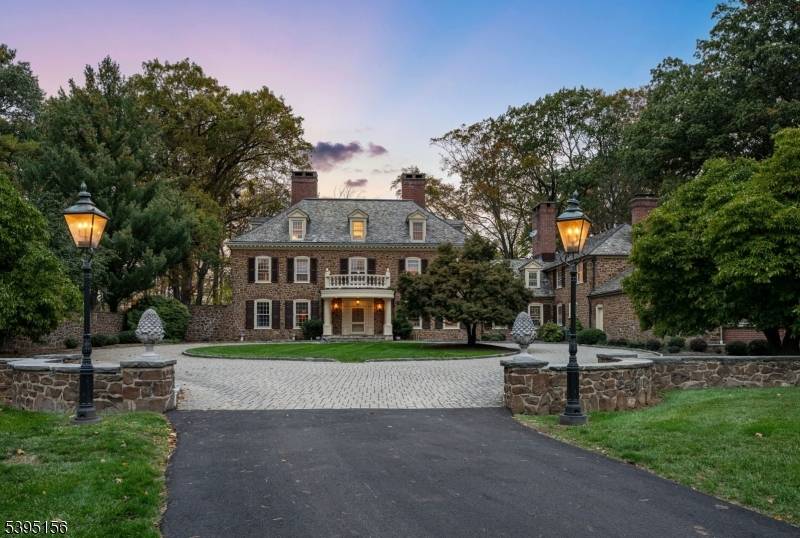 This extraordinary estate sits on approximately 6 private acres and offers over 13, 000 square feet of refined living space.