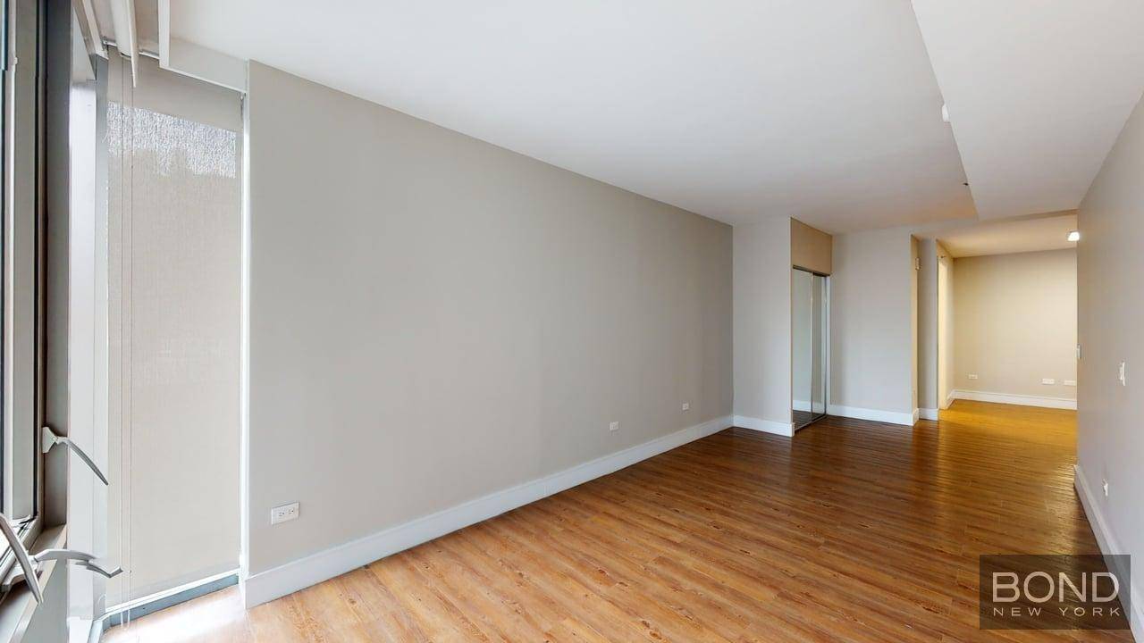 Enormous alcove studio Junior 1 with a balcony in prime Murray Hill location !