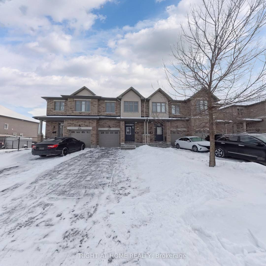Exceptionally well maintained and spotless townhome in the sought after Findlay Creek Sundance community.