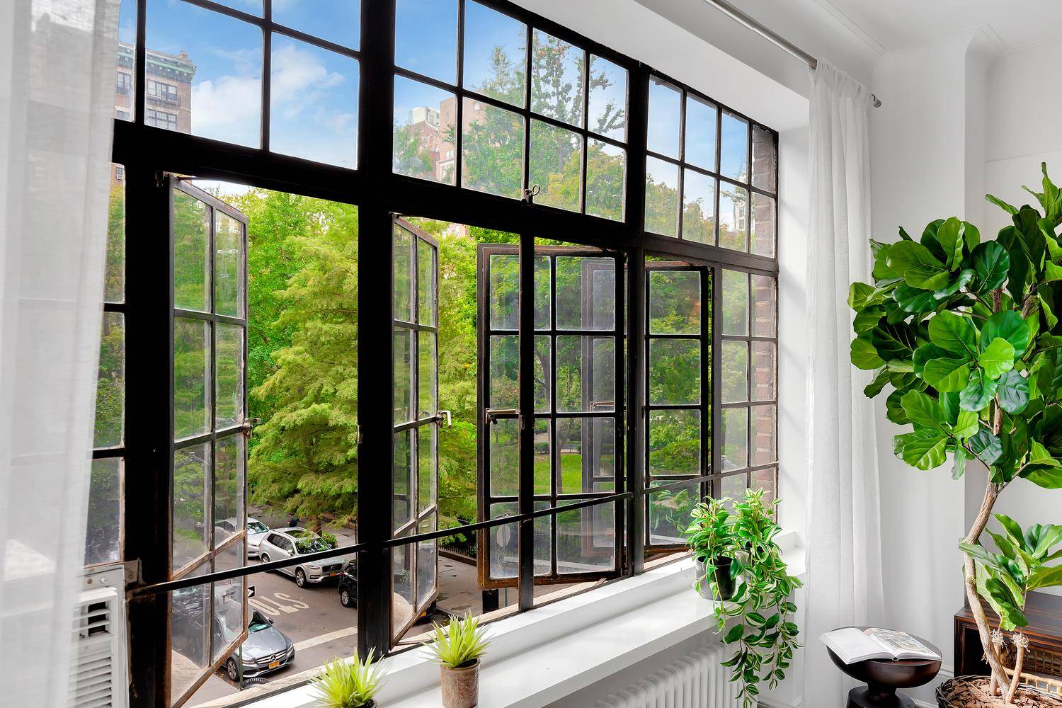 KEYS TO GRAMERCY PARK ! Magnificent Home facing South with Delightful Views of Gramercy Park in a highly sought after Prewar Coop.