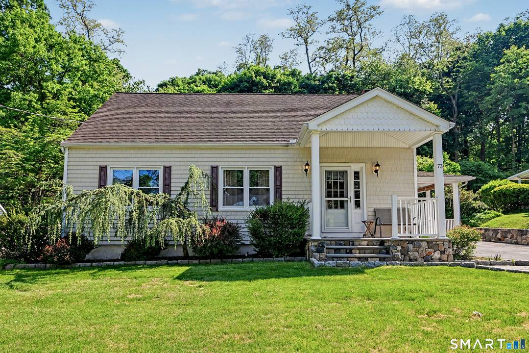 Charming and beautifully maintained 1956 Cape Cod offering timeless character with thoughtful updates throughout.