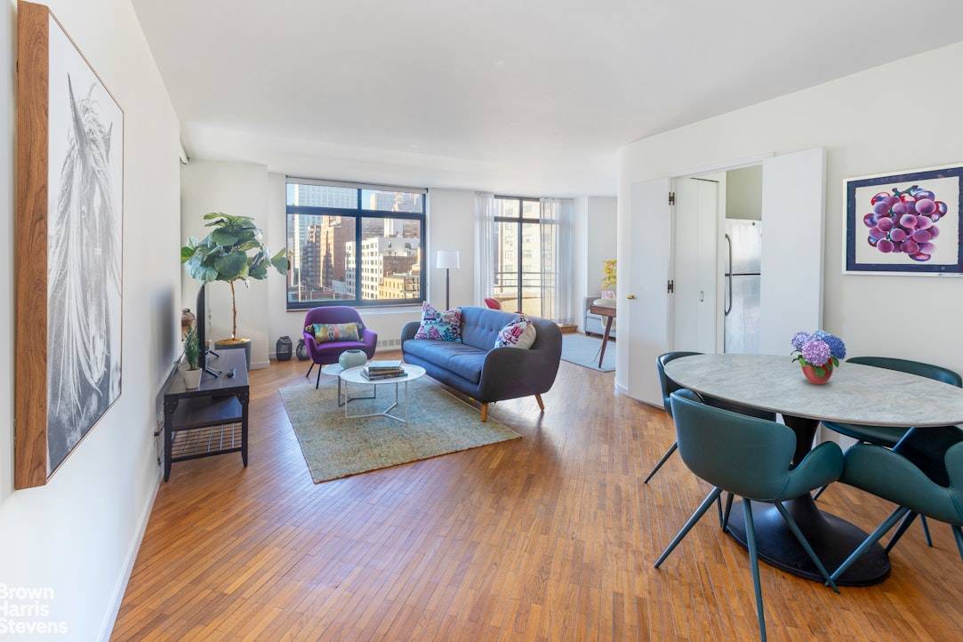 Welcome to 1004 a spacious, airy and sun drenched flexible 2 bedroom home facing south, west and north on beautiful East 70th Street.