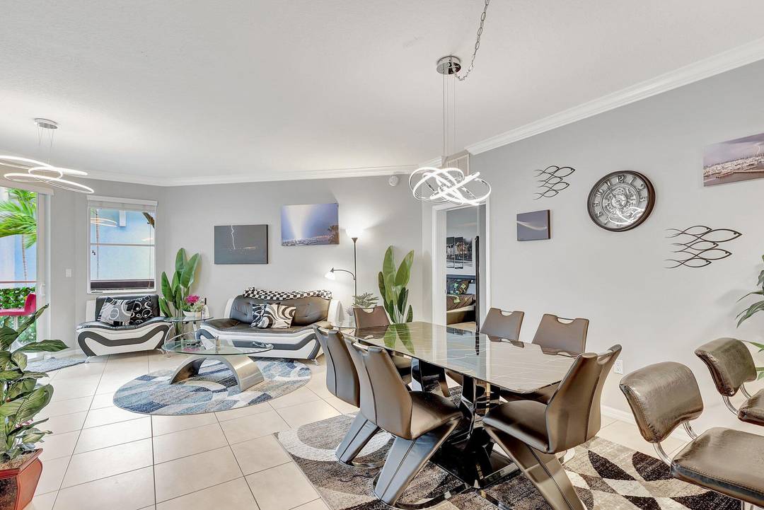 Discover luxury at The Harborage Yacht Club Condos in this fully furnished, turnkey 2 bedroom, 2 bath waterfront condo, meticulously updated with modern charm and upgrades.