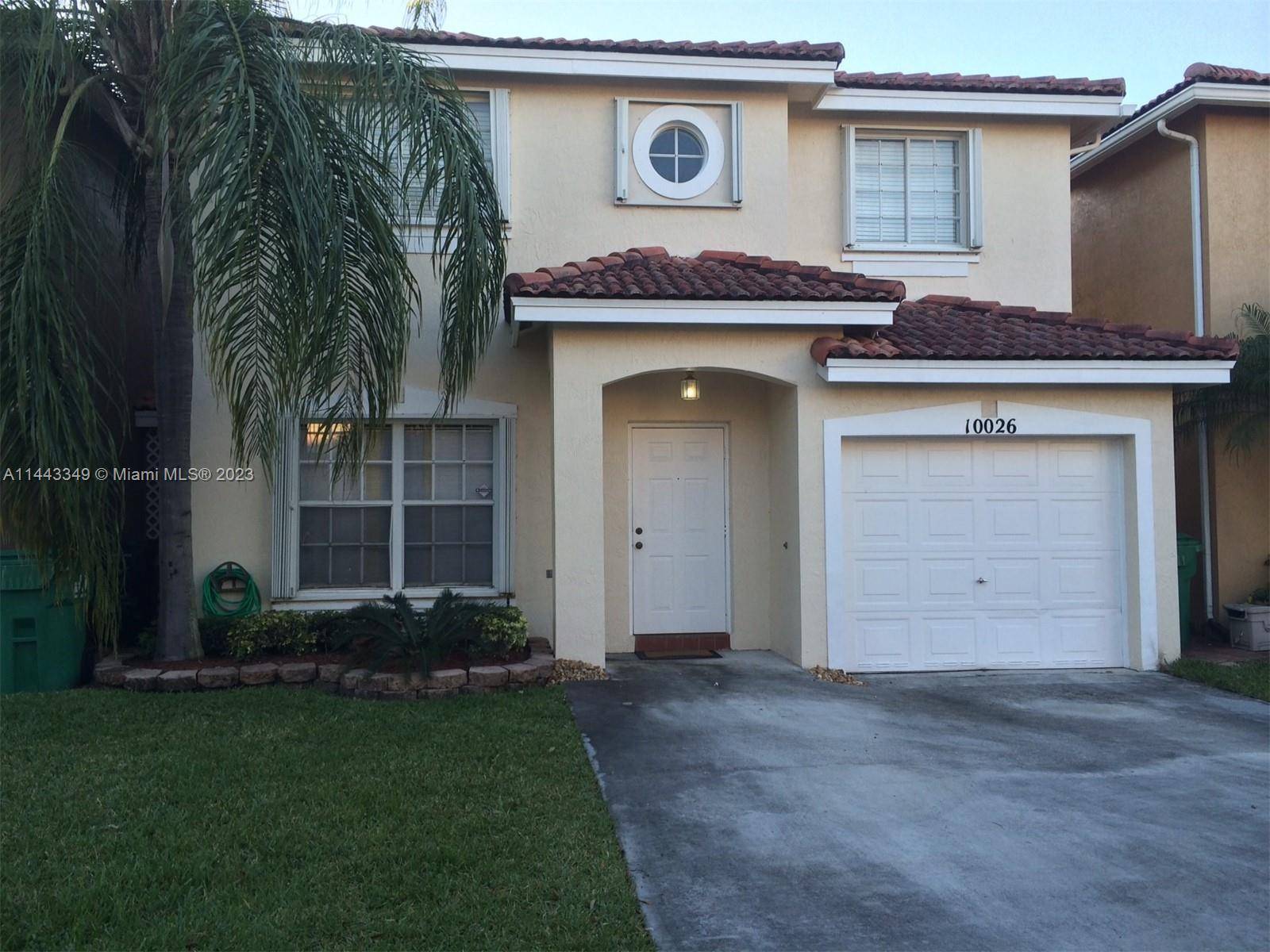 Beautiful single family, two story 3 2 1 2 home in the desirable Forest Lakes with ceramic tiles on first floor and laminated wood floors upstairs.