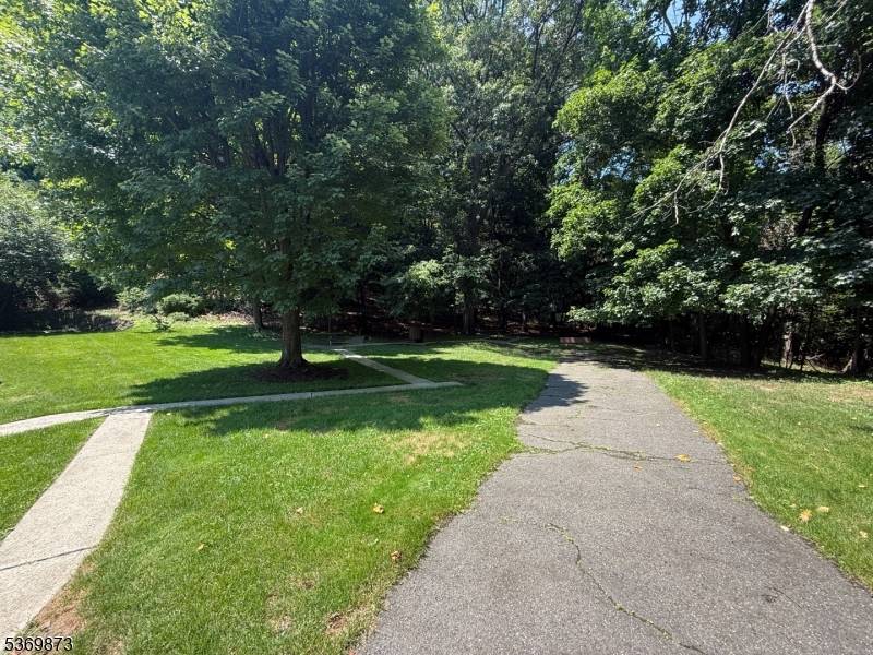 CHARMING TOWNHOUSE LOCATED ON THE BEST STREET IN THE COMPLEX ON A DEAD END !