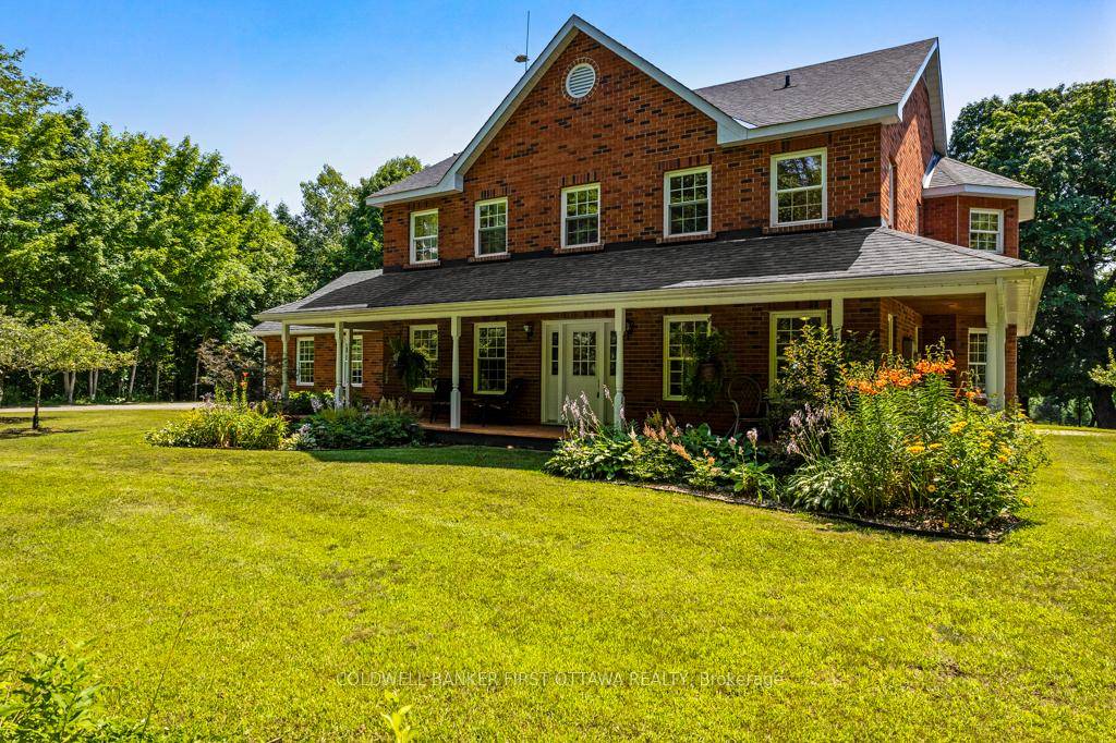 Gracious home on natural oasis of 11 tranquil acres.