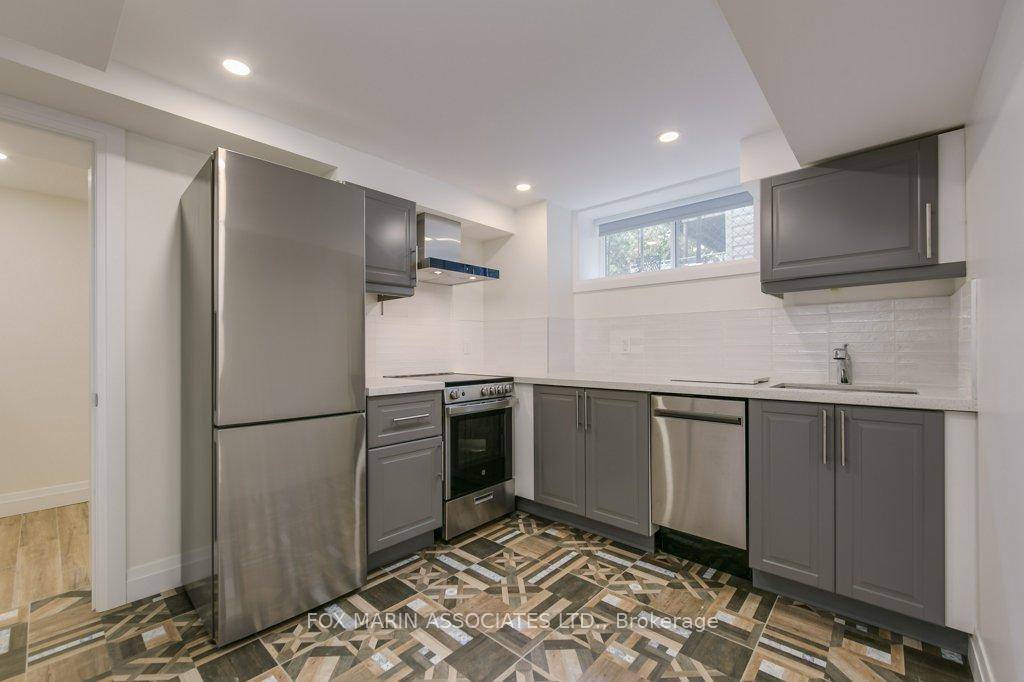 Welcome to this bright and modern, newly renovated studio lower level suite in the vibrant St.