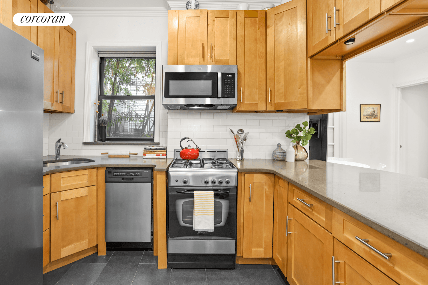 Welcome home to 322 6th Street, Apt 5 a cute as a button, two bed, one bath, 1st floor co op with lots of extras in Prime Park Slope !