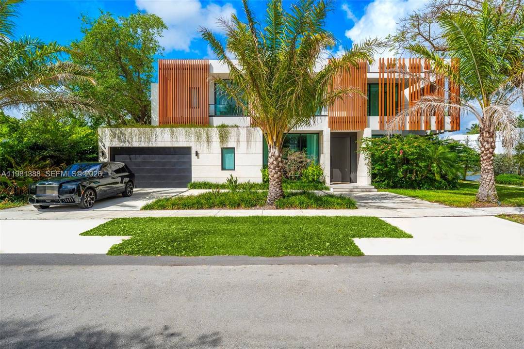 Step into a newly completed tropical modern estate by the Balli Group, designed by Balli Trautman Architects and set in the prestigious Ponce Davis enclave.