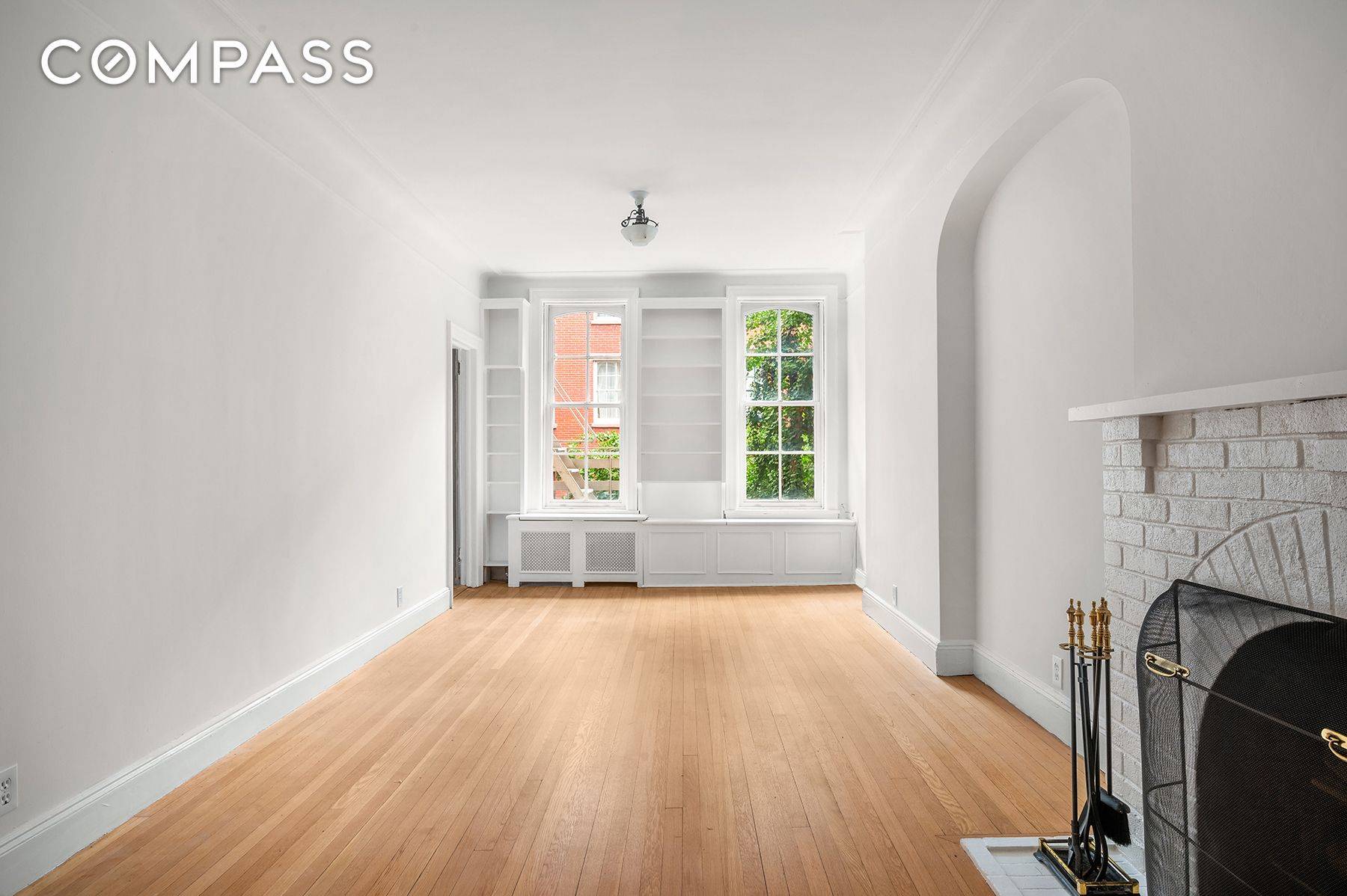Welcome to 29 Perry Street, Apartment 2F, a quintessential West Village home that blends historic charm with an exciting opportunity to reimagine the space to your own taste.