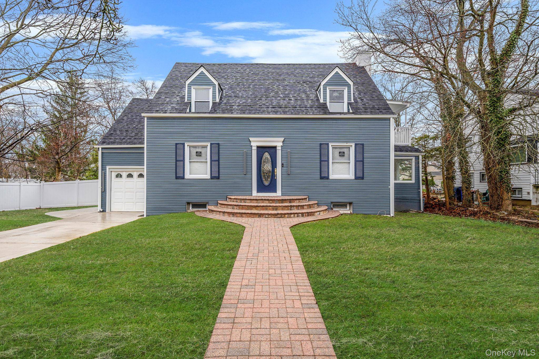 Welcome to 255 Moore Ave, Freeport, NY 11520 A beautifully renovated home offering modern comfort and luxurious amenities !