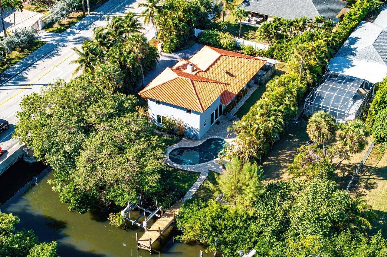 Charming Boutique Estate on Hypoluxo Island Perfect Blend of Luxury and Privacy Nestled on the tranquil lagoon side of Hypoluxo Island and overlooking a nature preserve, this exquisite gated estate ...