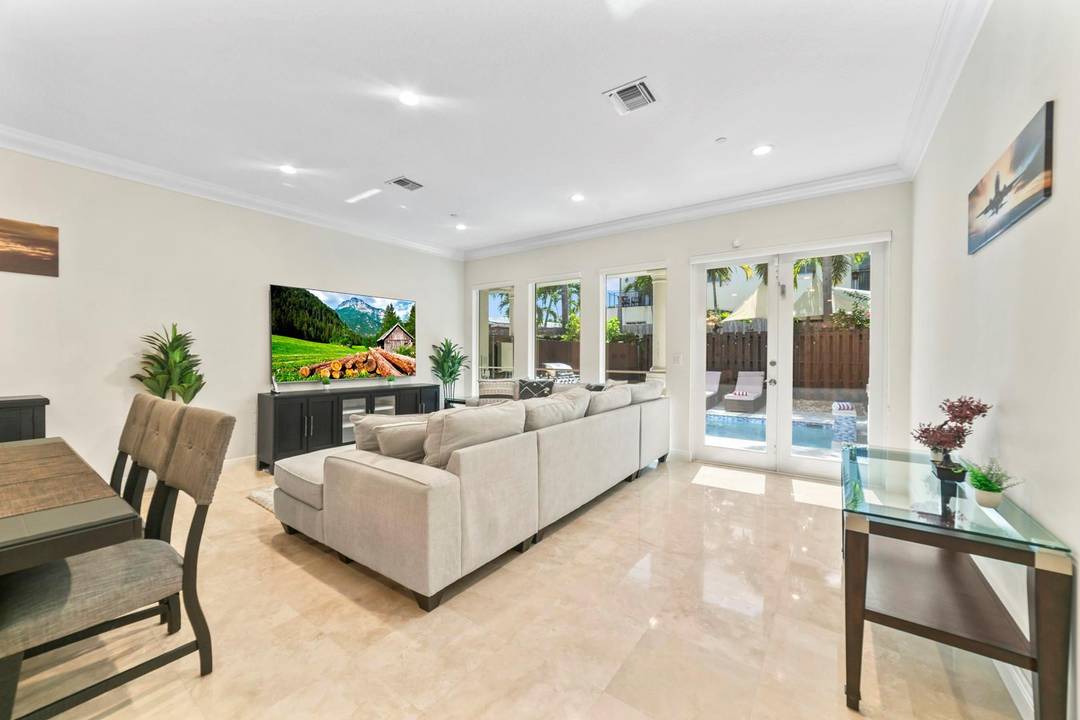 Stunning fully furnished 3 story luxury townhome in the heart of Fort Lauderdale, just 2 miles to the beach and located in a prime east of US 1 neighborhood known ...