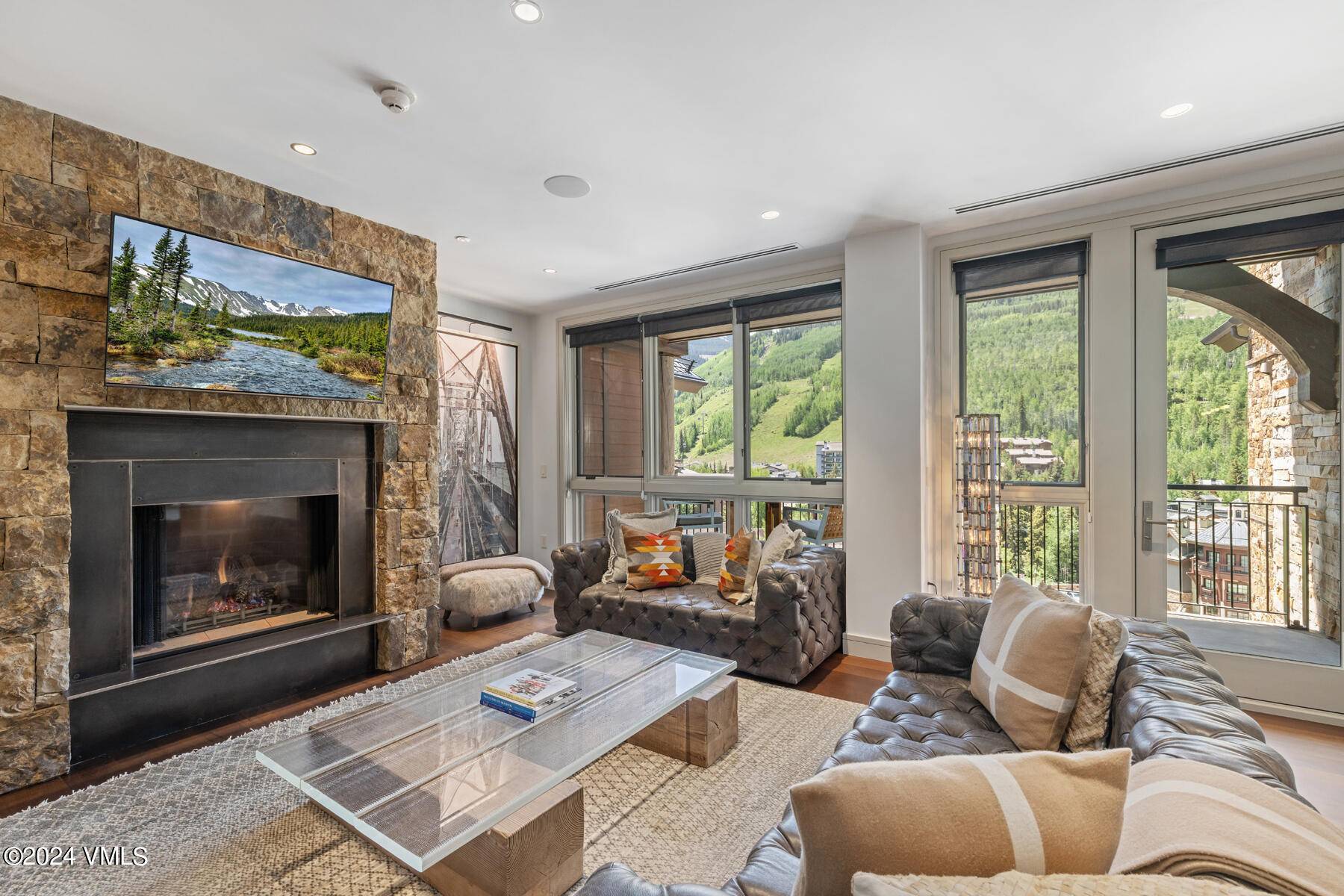 Beautifully remodeled and tastefully appointed in a modern and sophisticated style, this 4 bedroom residence also includes a large den and has direct south facing ski slope views towards Vail ...