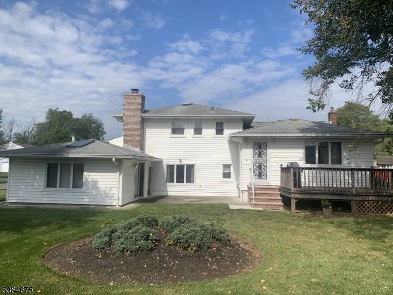 Grade level foyer entry Split level home, one owner home with additions to the kitchen, Family Room and a Bonus room on grade level with slider to patio.