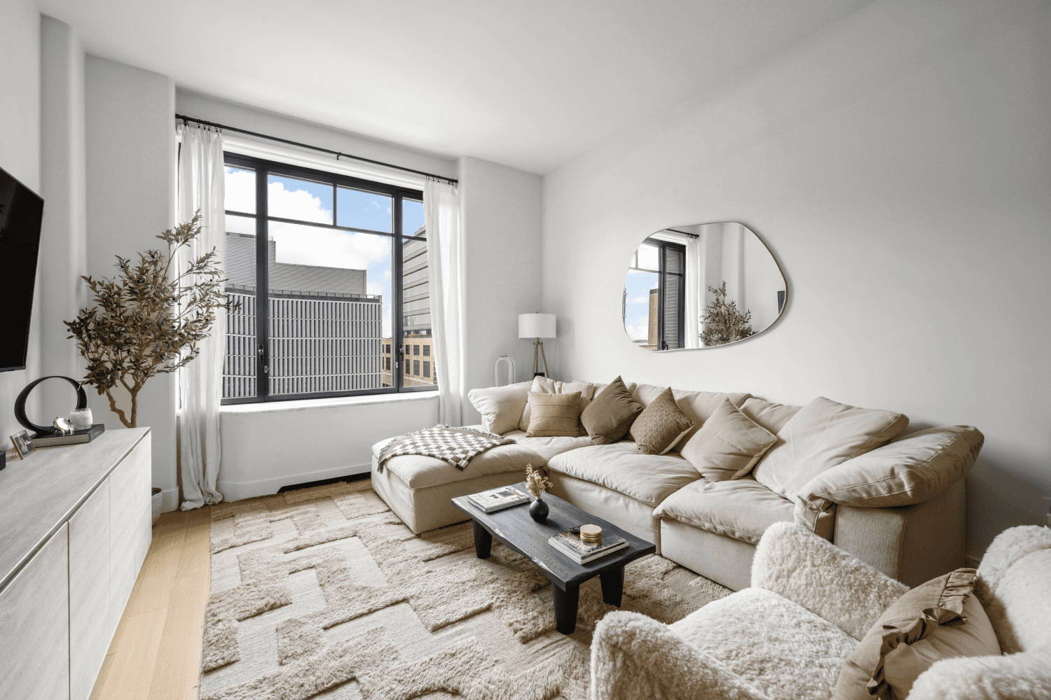Residence 8A at Greenwich West offers a thoughtfully designed two bedroom, two bathroom condominium with both Western and Southern exposures.