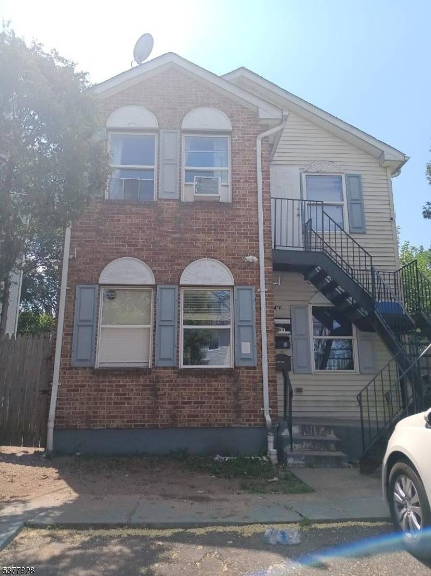 Young 2 Family Home offering legal 2 Family home up and down.