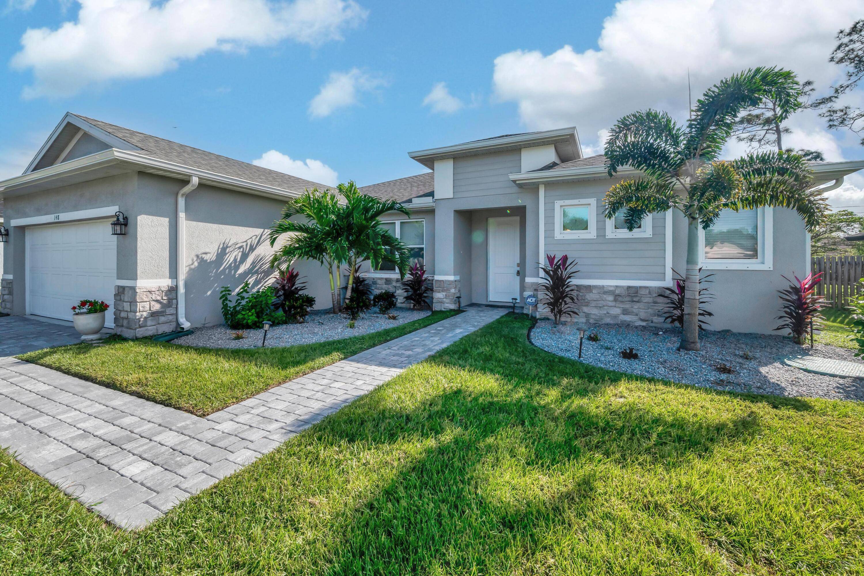 Welcome to this exceptional 3 bedroom, 2 bathroom home, meticulously crafted by Carharp Homes in 2022.