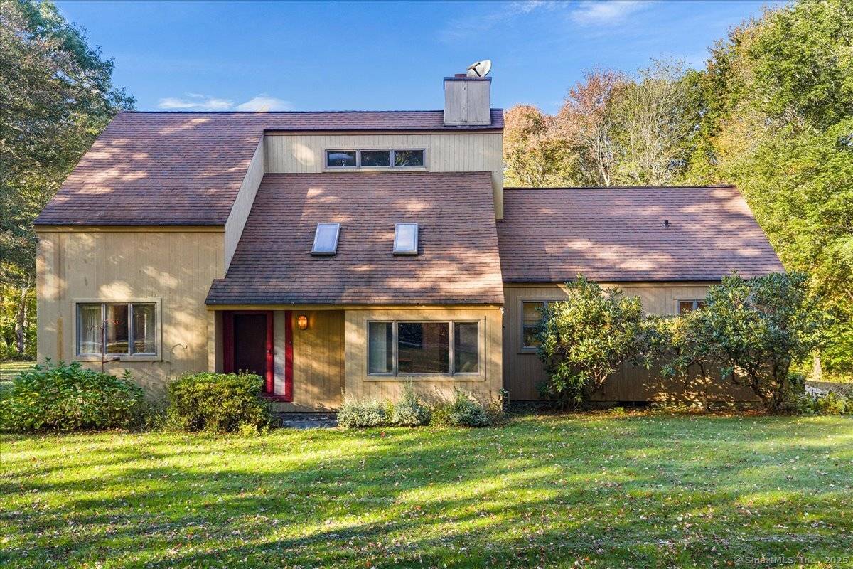 Nestled on a private piece of land surrounded by mature trees, 1399 Route 163 in Montville offers the perfect blend of comfort and tranquility.
