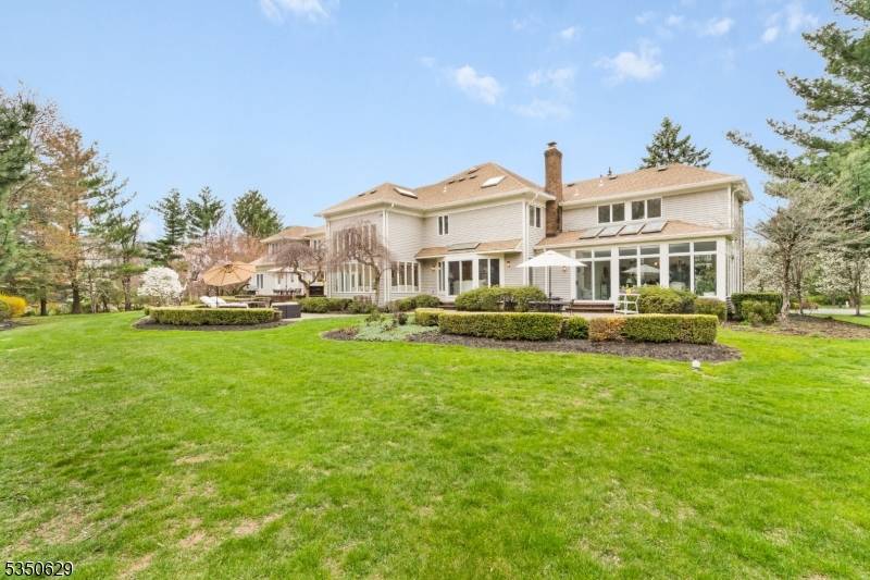 Experience luxury, comfort and convenience of this William Halsey designed home on the East side of Menham.