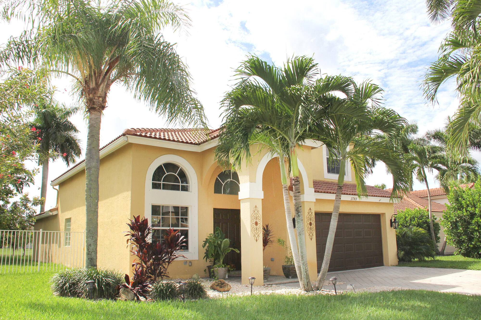 Beautiful 2 story lake home in Grand Isles at Wellington, features newly resurfaced heated pool, chef kitchen with stainless steel appliances quarts countertops, reverse osmosis purified water system throughout the ...
