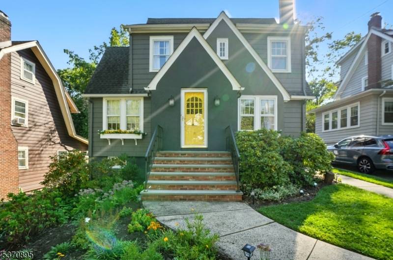 Welcome to your dream home, perfectly situated in a highly desirable neighborhood just a short stroll from the Village and direct trains to NYC.