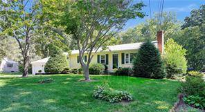 Welcome to 47 Hickory Lane in Essex, CT a beautifully remodeled 3 bedroom, 2 bathroom ranch style home nestled on a spacious 0.