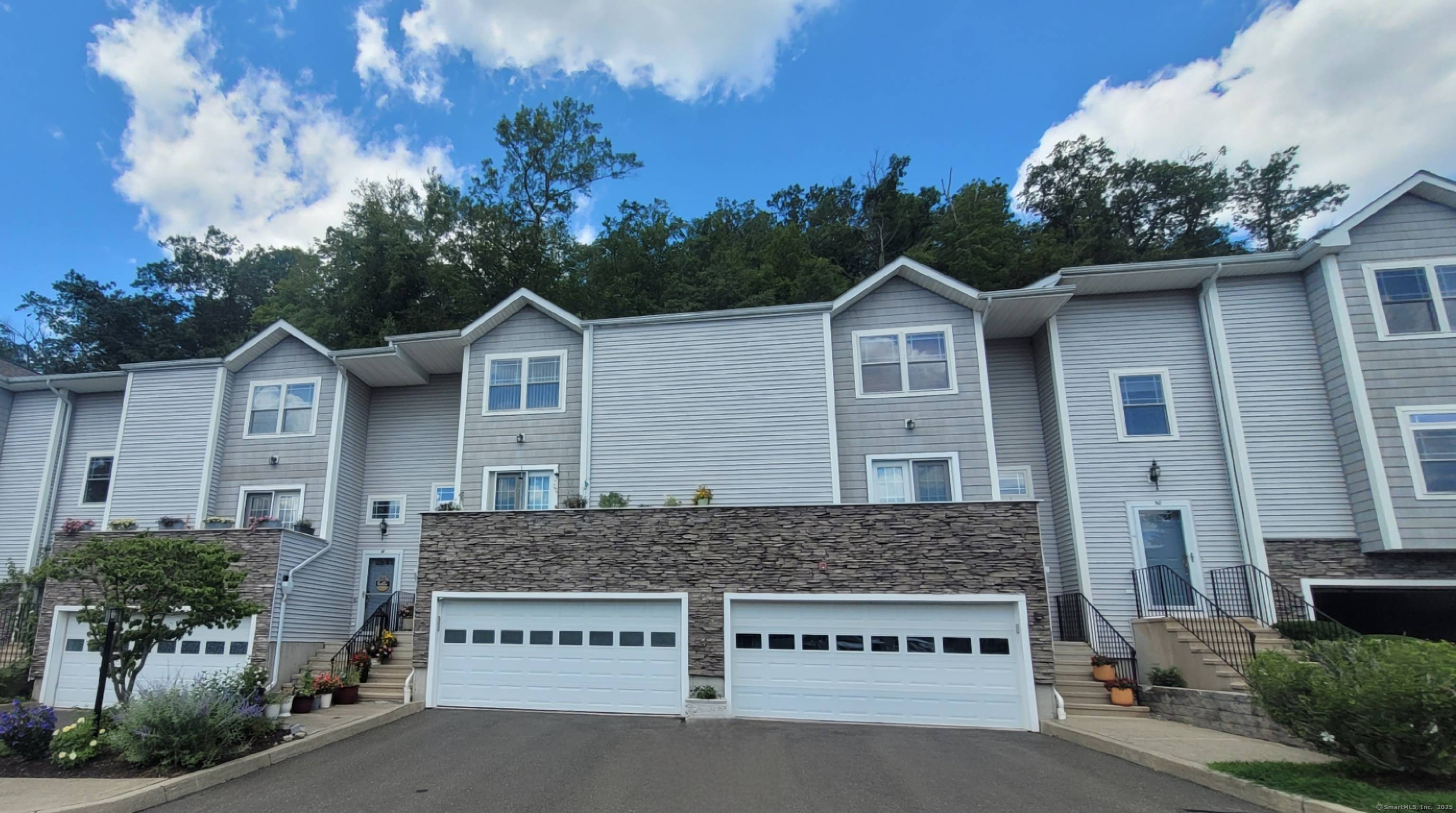 Welcome to 48 Stetson Place, a refined and beautifully maintained enclave of upscale townhomes.