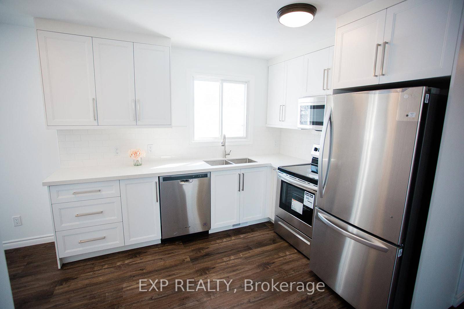 Newly renovated, upper floor unit of a LEGAL duplex.