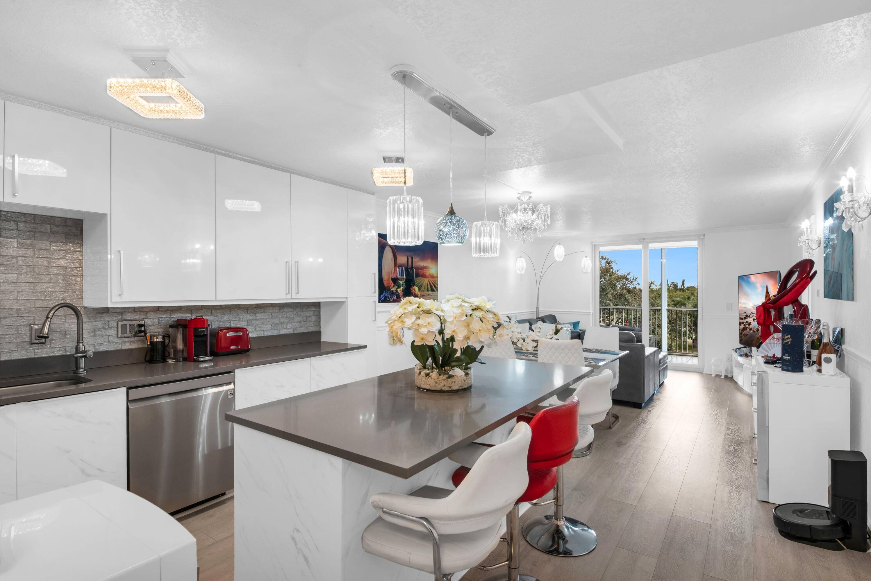 This meticulously remodeled 3 bedroom unit in Boca Teeca is calling the pickiest buyers to come make it their home !