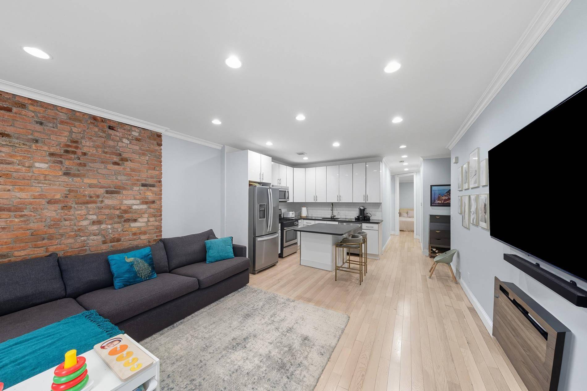 Welcome to 1592 Saint Marks Avenue, a beautifully renovated semi detached two family townhouse situated on a leafy block in Ocean Hill, bordering Crown Heights.