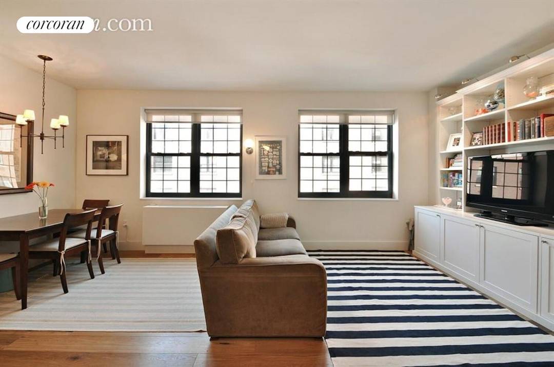 Welcome to this well appointed two bedroom, two bath residence at Columbia Commons Condominium in Cobble Hill's Columbia Street Waterfront District.