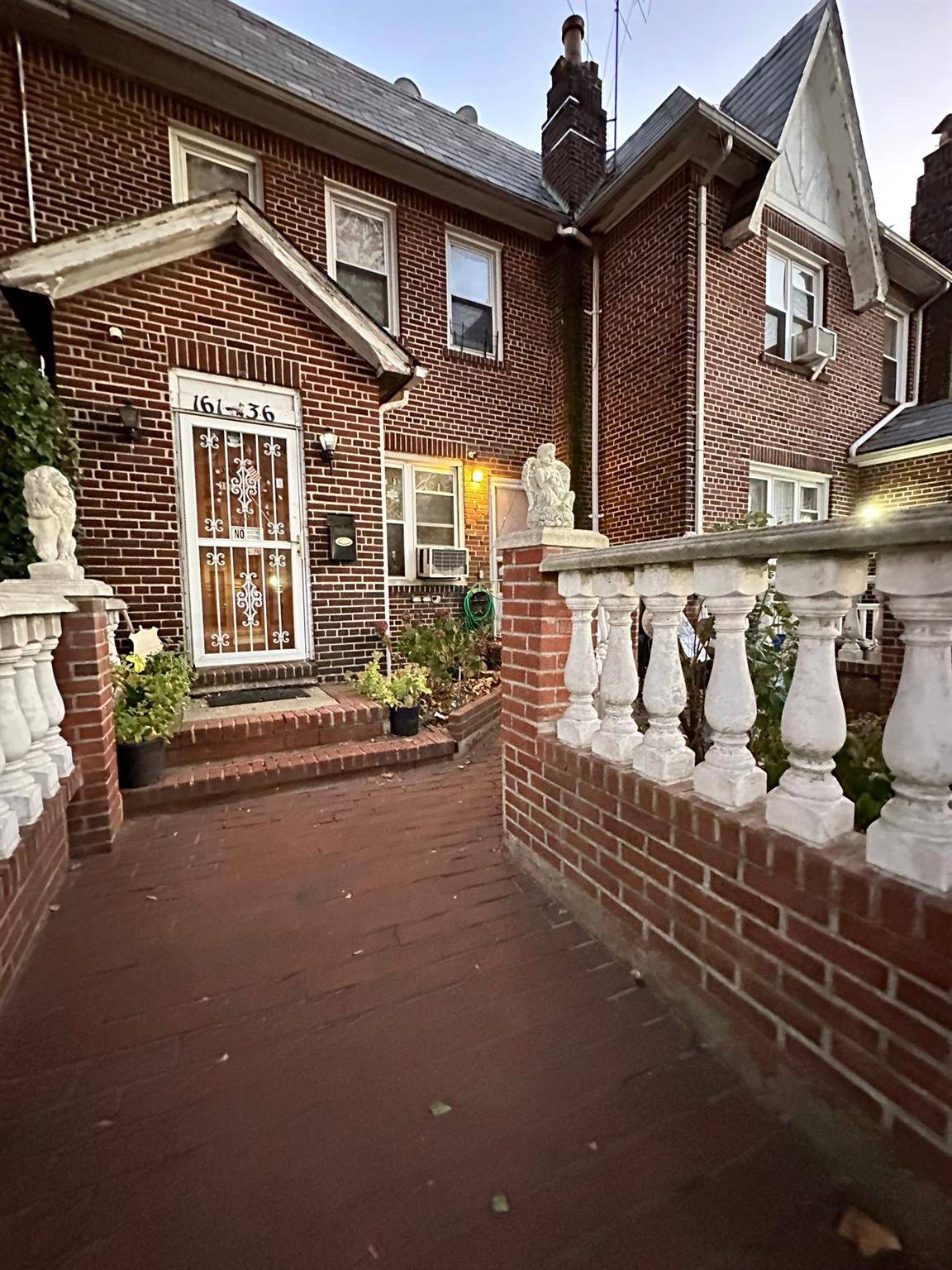 Legal 2 Family Brick Attached Home.