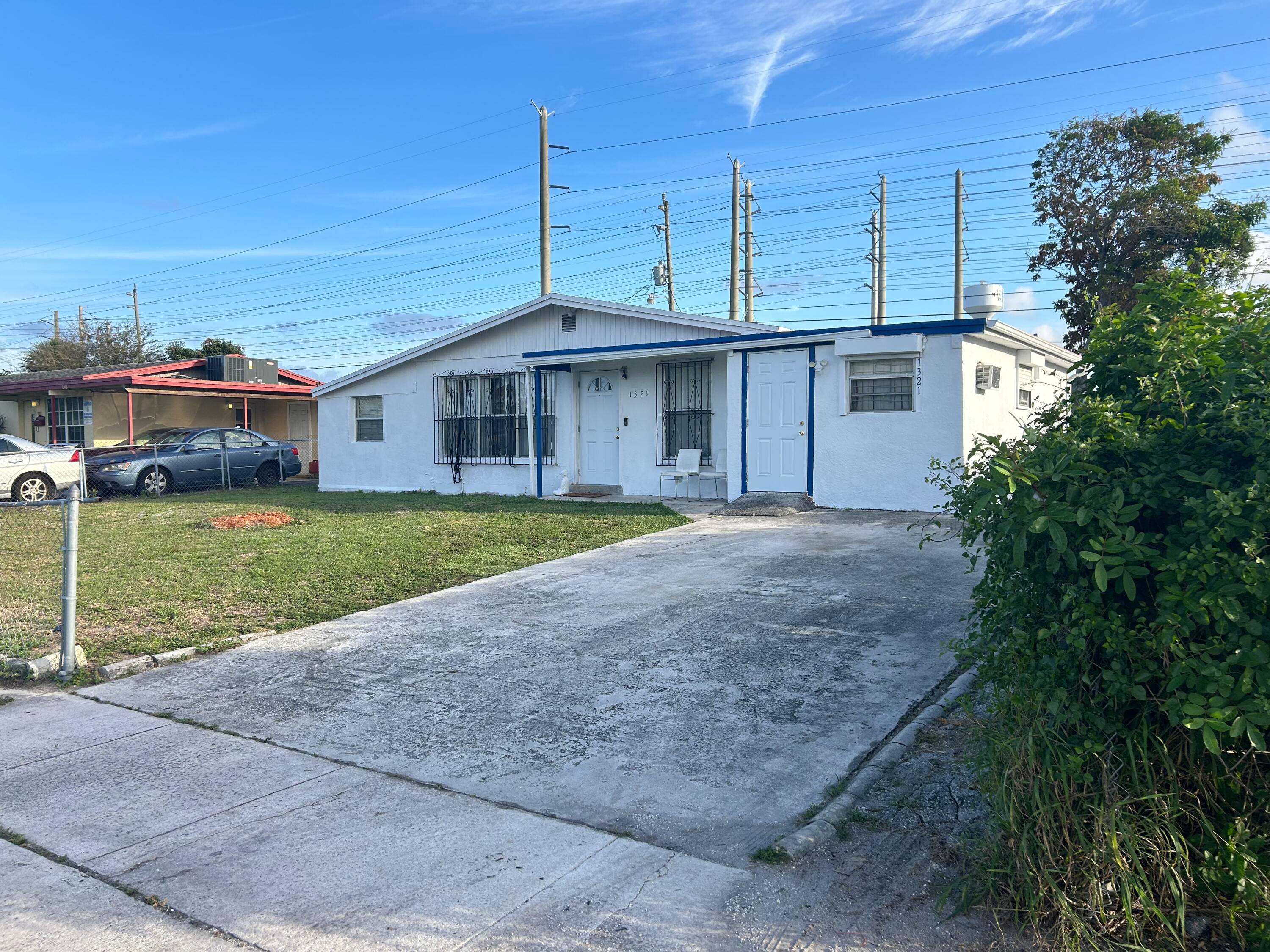 This meticulously maintained 4 bedroom, 2 bathroom residence offers the perfect blend of comfort and style in the desirable Riviera Beach, Florida.