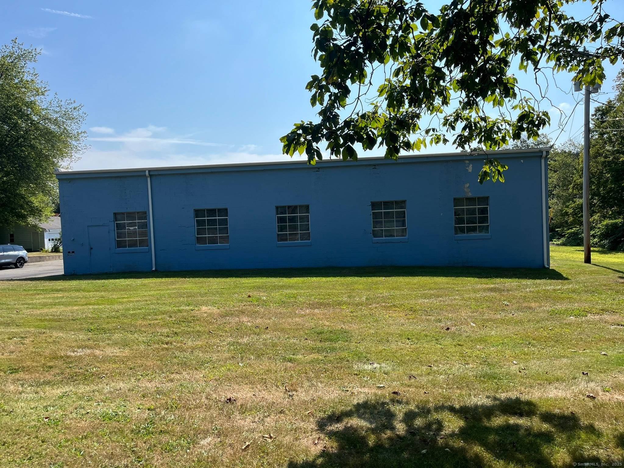 4, 830 sq. ft. industrial building, previously used for truck parking.