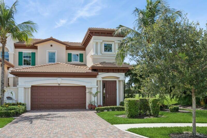 Welcome to luxury living in the prestigious gated community of Jupiter Country Club.